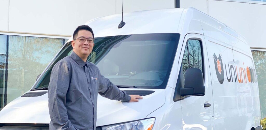 UniUni • Peter Lu in Front of UniUni Delivery Truck
